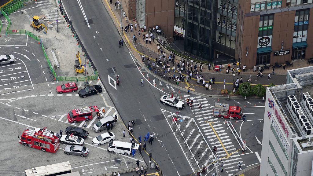 This aerial photo shows the scene of gunshots in Nara, western Japan Friday, July 8, 2022. Japan’s former Prime Minister Shinzo Abe was in heart failure after apparently being shot during a campaign speech Friday in western Japan, NHK public television said Friday. (Kyodo News via AP)(Kyodo News via AP) TKMY804