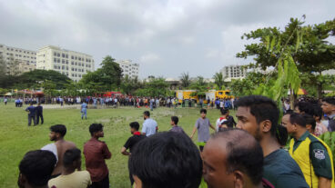 Volunteers cordon off the area after a Bangladesh Air Force training aircraft has crashed onto a school campus in Dhaka, Bangladesh, Monday, July 21, 2025. (AP Photo/Mahmud Hossain Opu) DHA101