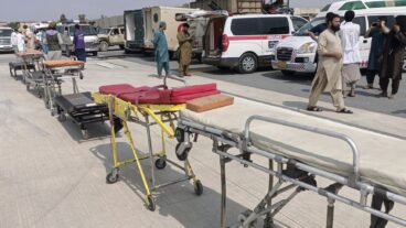 In this photo released by the Nangarhar Media Center, stretchers and ambulances are prepared to receive victims of an earthquake that killed hundreds and destroyed numerous villages in eastern Afghanistan, at Nangarhar Airport in Nangarhar, Afghanistan, Monday, Sept. 1, 2025. (Nangarhar Media Center via AP) XEM103