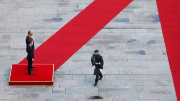 German Chancellor Friedrich Merz, rear left, welcomes Sweden's Prime Minister Ulf Kristersson, front left, with military honors for a meeting at the Chancellery in Berlin, Germany, Wednesday, Nov. 19, 2025. (Odd Andersen/Pool Photo via AP)  DSOB102