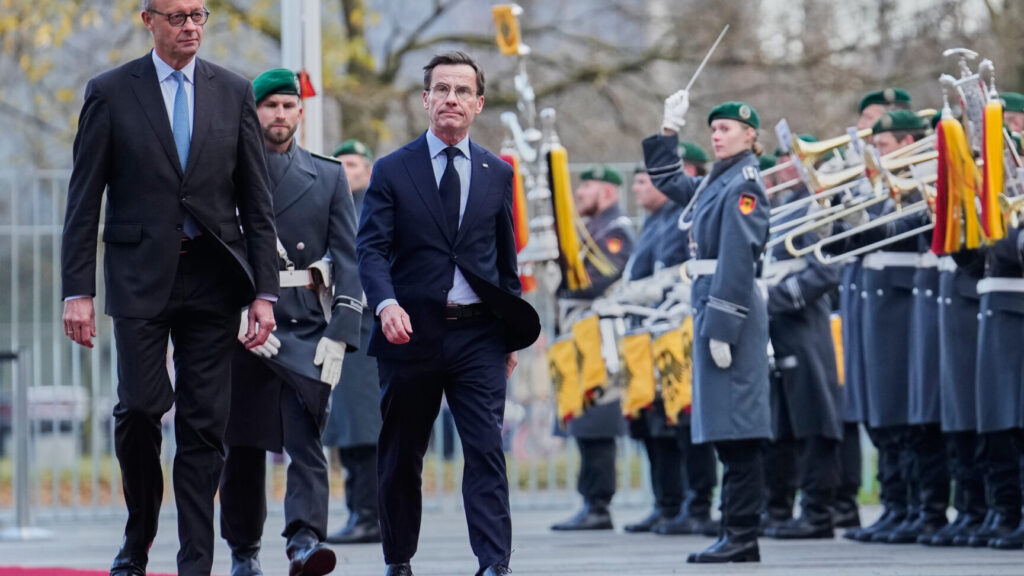 German Chancellor Friedrich Merz, left, welcomes the Prime Minister from Sweden Ulf Kristersson, right, for a meeting at the chancellery in Berlin, Germany, Wednesday, Nov. 19, 2025. (AP Photo/Ebrahim Noroozi) XENO112