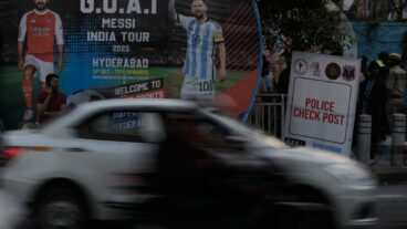 Motorists ride past a billboard of Argentine soccer star Lionel Messi and Telangana Chief Minister Anumula Revanth Reddy, hours before Messi's arrival in the capital city Hyderabad, India, Saturday, Dec. 13, 2025. (AP Photo/Mahesh Kumar A.)  MKA101
