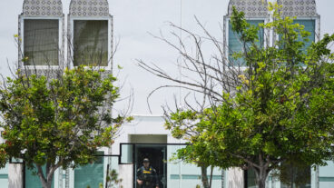 Police stage at the scene of a shooting outside the Islamic Center of San Diego Monday, May 18, 2026, in San Diego. (AP Photo/Gregory Bull)  LA119