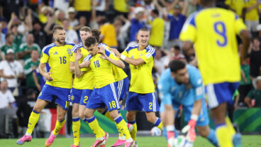 Sweden's Yasin Ayari (18) is surrounded by teammates after scoring the opening goal during the World Cup Group F soccer match between Sweden and Tunisia in Guadalupe, near Monterrey, Mexico, Sunday, June 14, 2026. (AP Photo/Addison Simmons)  WCTH127