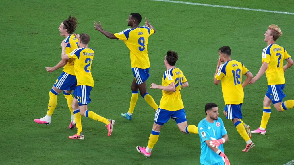 Sweden's Mattias Svanberg, left, celebrates with Alexander Bernhardsson (21) and Alexander Isak (9) after scoring their fourth goal during the World Cup Group F soccer match between Sweden and Tunisia in Guadalupe, near Monterrey, Mexico, Sunday, June 14, 2026. (AP Photo/Dolores Ochoa) WCLM792