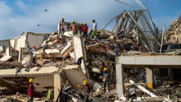 Members of the French Civil Security Training and Intervention Regiment (UIISC 7) help residents in the search for victims in Caraballeda, La Guaira state, Venezuela, on Saturday, June 27, 2026. (Miguel Medina/Pool Photo via AP)  vemm607