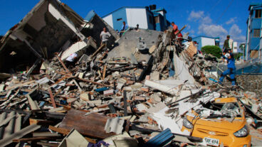 Residents search through the rubble after an earthquake struck Pereira, Colombia, Monday, Aug. 10, 2026. (AP Photo/Miguel Angel Lopez)  XRM895